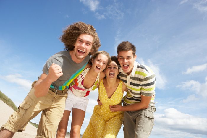 Group Of Friends Having Fun On Summer Beach