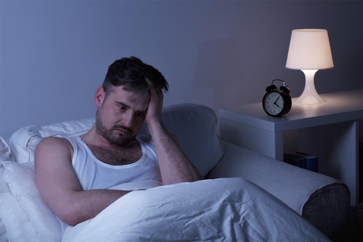 goodencenter-Sleep-and-Mental-Health-photo-of-a-man-suffering-from-sleeplessness