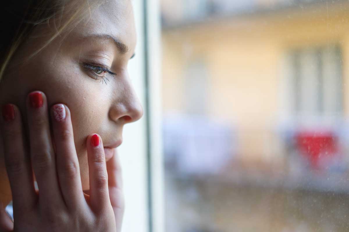 goodencenter-ten-Ways-to-Track-Your-Mental-Health-photo-of-young-girl-next-to-window-glass