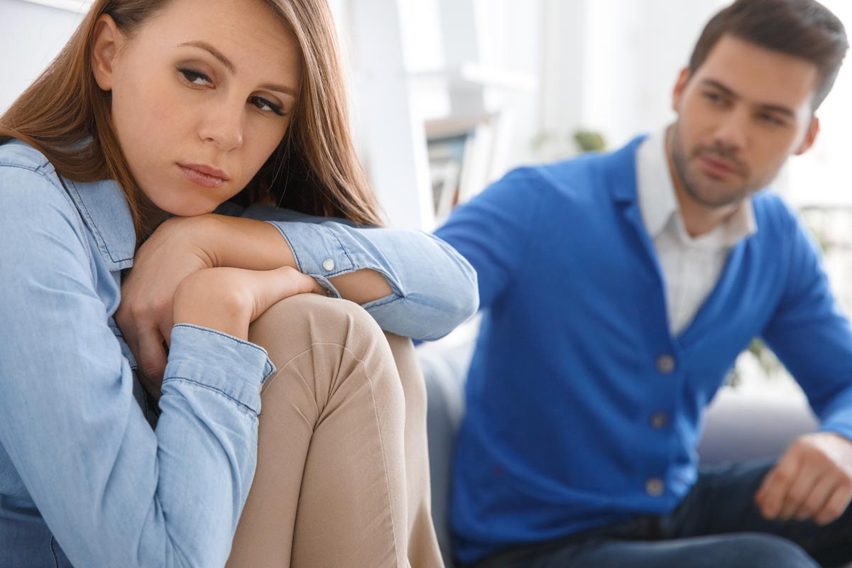 goodencenter-How-to-Help-Someone-Who-Is-in-Denial-of-Their-Mental-Illness-photo-of-young-couple-waiting-for-psychology-session-family-problems