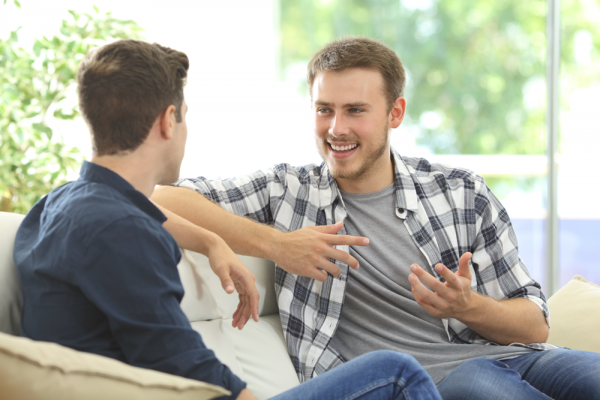 Gooden Center 12 Cool Inspirational Quotes for Your Recovery photo of Two friends talking sitting in a couch in the living room