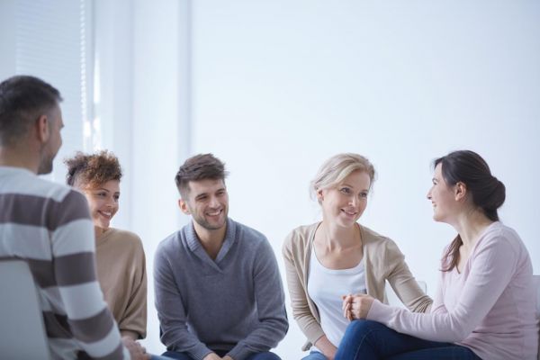 Gooden Center How Should a Sober Christian Handle Depression photo of Group of young people helping each other during fellowship