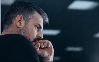 goodencenter Mens Mental Health Treatment photo of Nervous man with withdrawal symptoms in rehab center for drug addicts