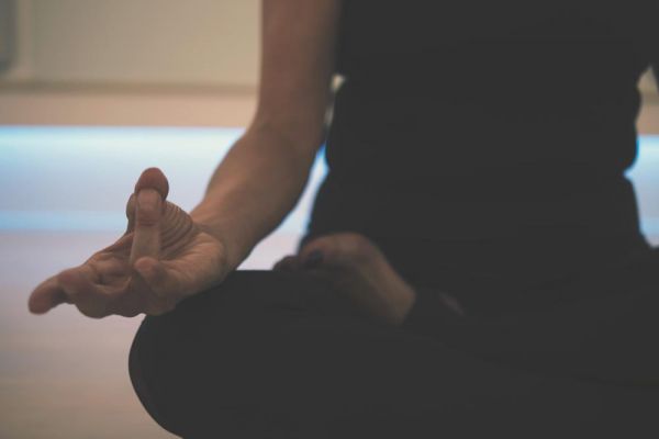 goodencenter Meditation and Mental Health photo of a woman doing yoga