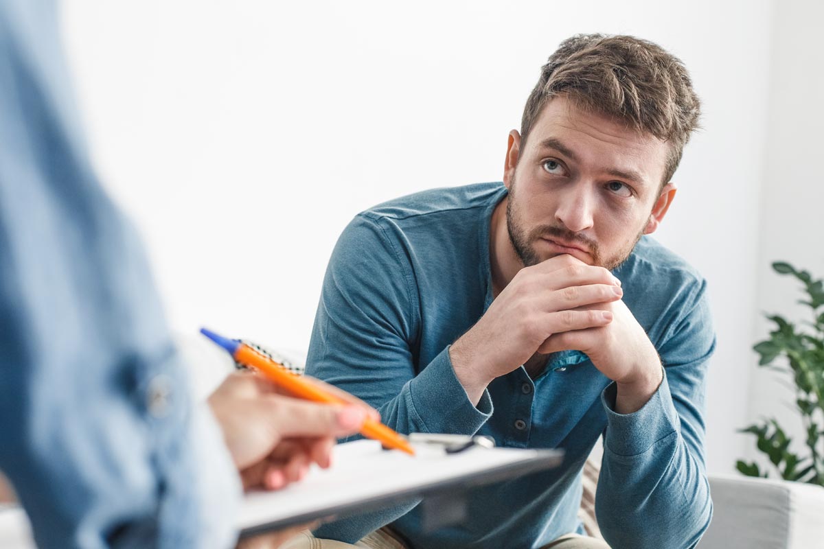 goodencenter Tips for Talking About Your Mental Health photo of Man with a psychologist during consultation