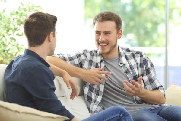 goodencenter-Tips-for-Talking-About-Your-Mental-Health-photo-of-two-men-chatting