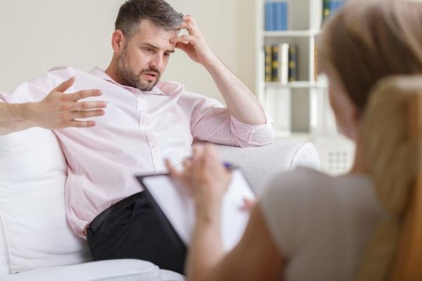 a man talking about his loneliness and depression on psychotherapy session